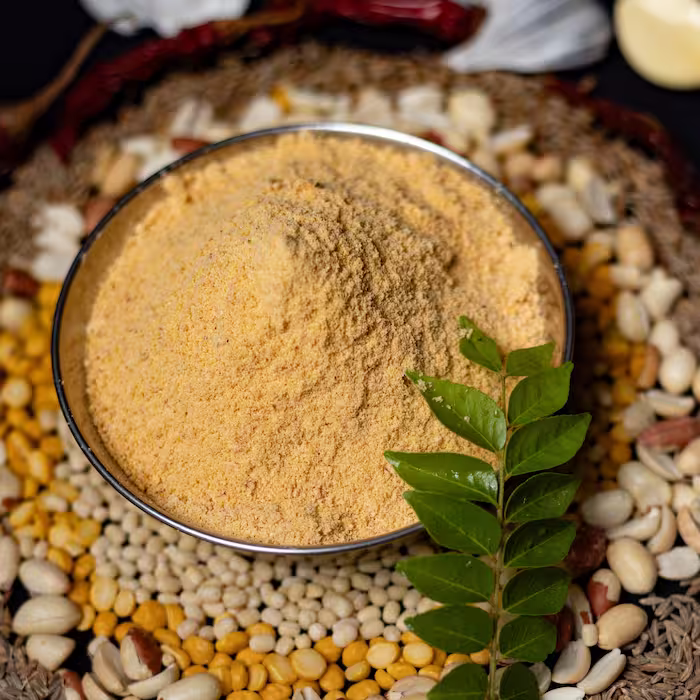 Garlic powder in a metal bowl used as a cooking seasoning